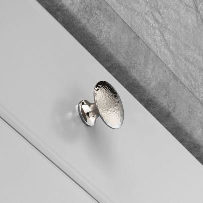 The image shown below is Hammered over Polished Nickel finish